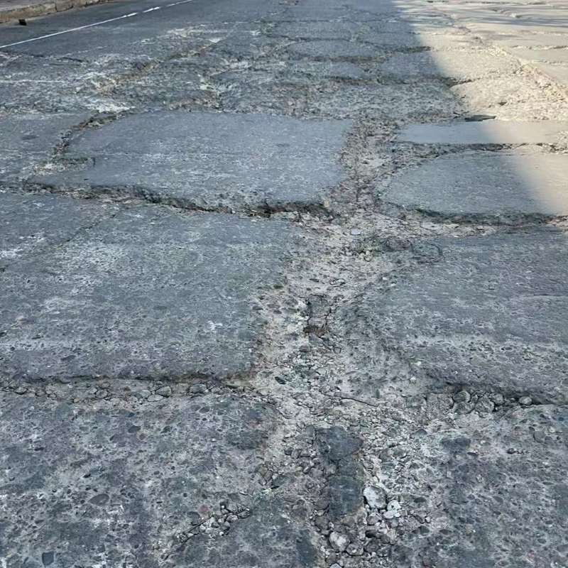 江岸路面起砂露石子修补料